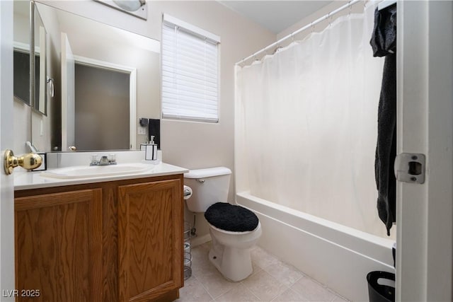 3120 Inlet Bay Ave, North Las Vegas, NV 89031 - full bathroom with tile patterned floors, vanity, toilet, and shower / bath combo with shower curtain