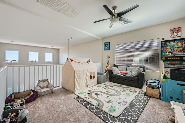 rec room with carpet flooring and ceiling fan