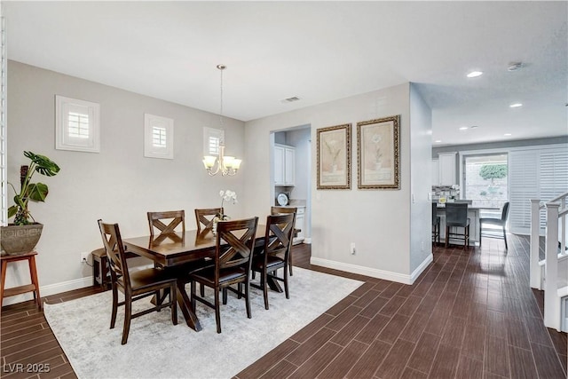 dining room featuring baseboards, a chandelier, dark wood-style floors, and recessed lighting