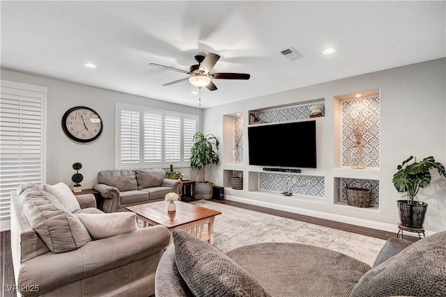 living room with ceiling fan, wood finished floors, recessed lighting, and baseboards