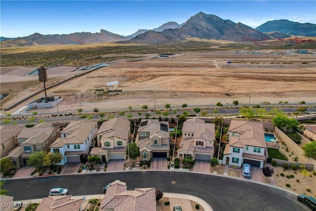aerial perspective of suburban area with mountains