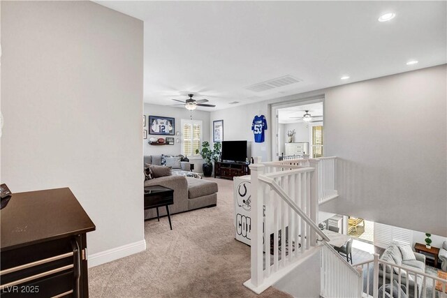 living area featuring a ceiling fan, carpet, healthy amount of natural light, and recessed lighting