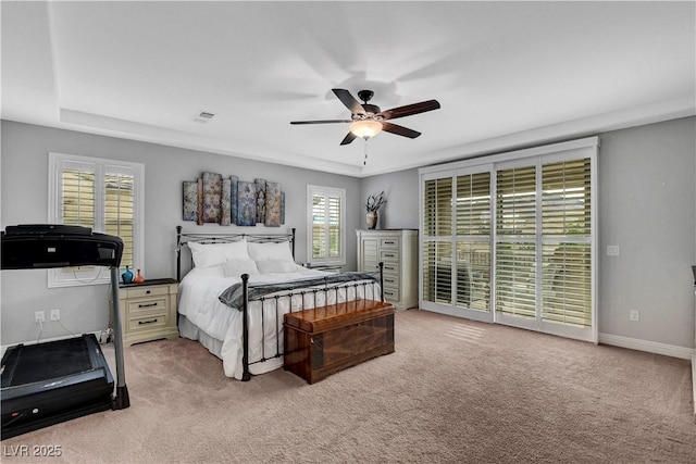 bedroom featuring light colored carpet, ceiling fan, access to exterior, and baseboards
