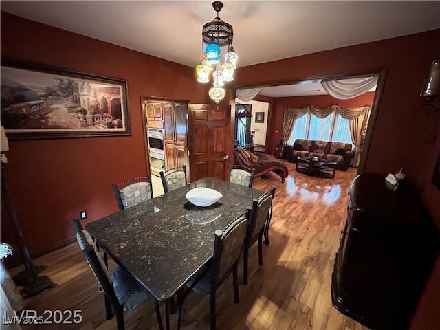 dining area featuring wood finished floors