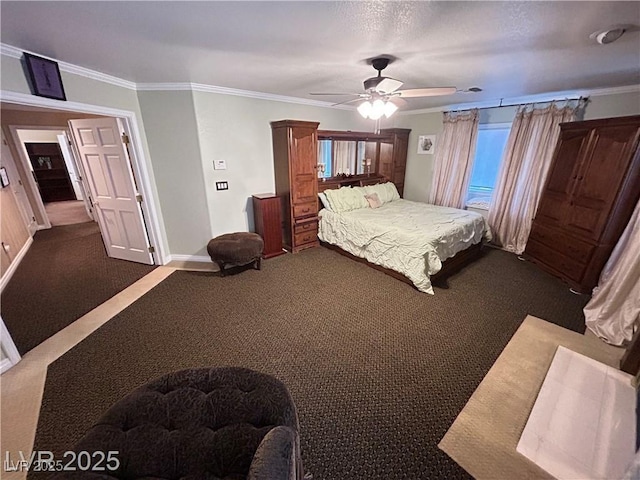 bedroom with dark colored carpet, ornamental molding, baseboards, and ceiling fan