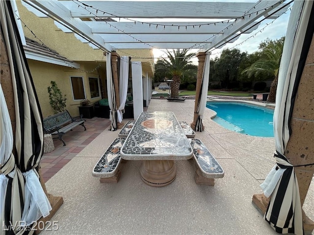 outdoor pool featuring a pergola and a patio