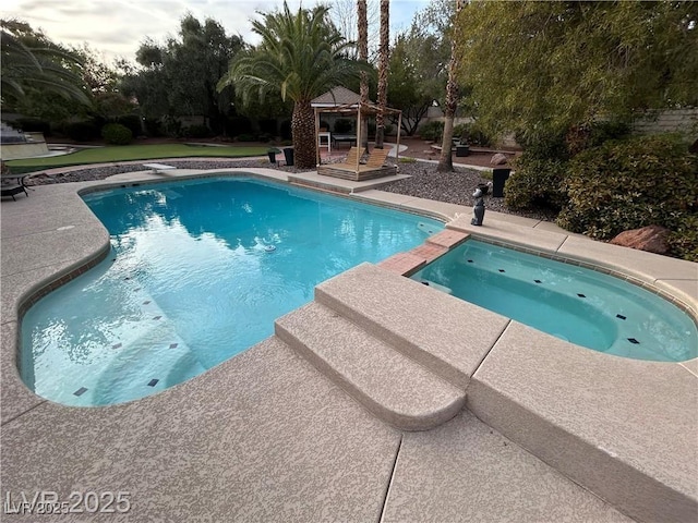 outdoor pool with a gazebo and a patio area