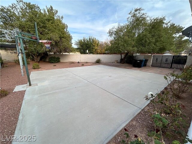 view of patio with a fenced backyard and a gate