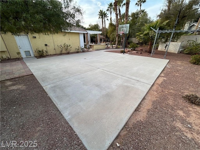 view of basketball court featuring a pergola