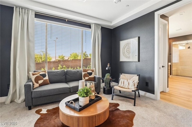 12155 Sage Thunder Ave, Las Vegas, NV 89138 - living area featuring healthy amount of natural light, carpet floors, and baseboards
