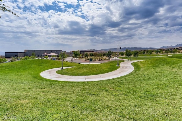 12155 Sage Thunder Ave, Las Vegas, NV 89138 - surrounding community featuring a mountain view and a yard