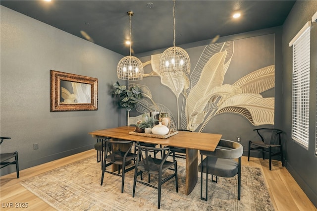 12155 Sage Thunder Ave, Las Vegas, NV 89138 - dining room with wood finished floors, a chandelier, baseboards, and recessed lighting