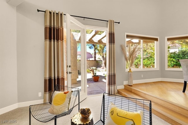 5142 Southern Hills Ln, Las Vegas, NV 89113 - sitting room with healthy amount of natural light and baseboards