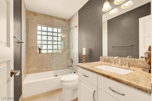 5142 Southern Hills Ln, Las Vegas, NV 89113 - bathroom with toilet, shower / bathtub combination, tile patterned floors, vanity, and a textured wall