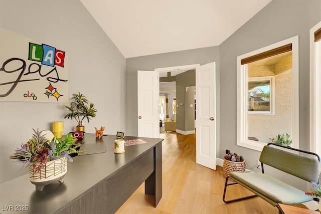 5142 Southern Hills Ln, Las Vegas, NV 89113 - home office featuring light wood finished floors and lofted ceiling