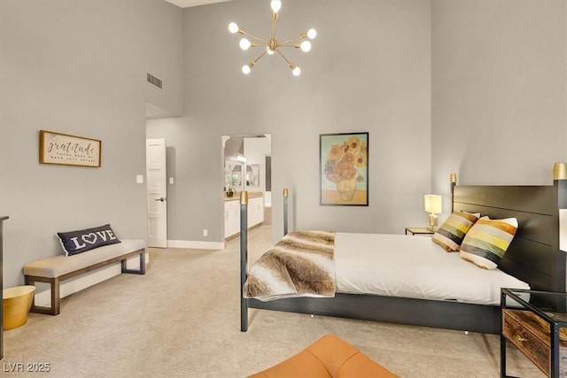5142 Southern Hills Ln, Las Vegas, NV 89113 - bedroom featuring high vaulted ceiling, carpet, a chandelier, ensuite bathroom, and baseboards