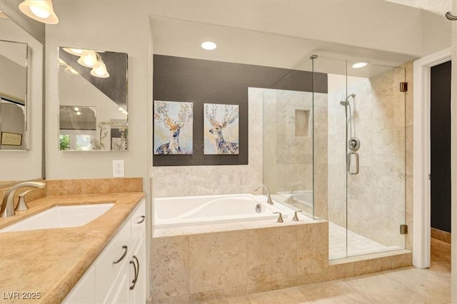 5142 Southern Hills Ln, Las Vegas, NV 89113 - bathroom featuring a garden tub, a stall shower, vanity, and tile patterned flooring