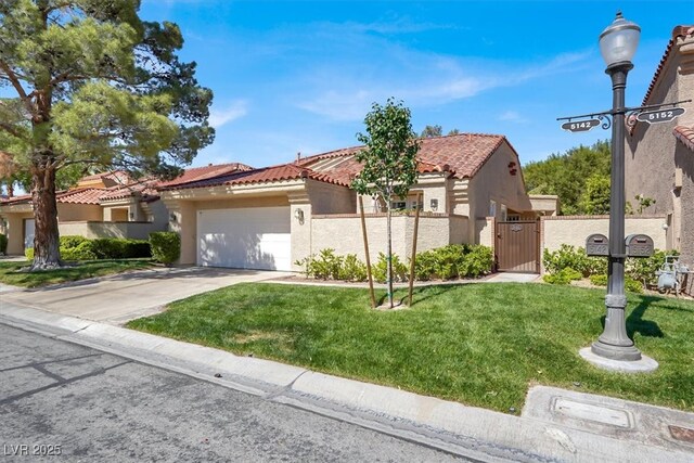 5142 Southern Hills Ln, Las Vegas, NV 89113 - mediterranean / spanish-style house featuring stucco siding, a tiled roof, an attached garage, driveway, and a gate