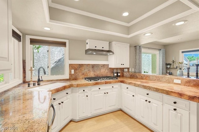 5142 Southern Hills Ln, Las Vegas, NV 89113 - kitchen with a sink, stainless steel gas cooktop, white cabinetry, recessed lighting, and tasteful backsplash