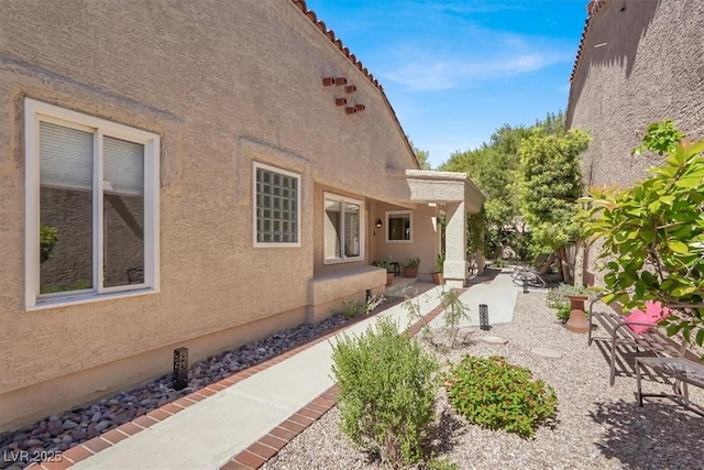 5142 Southern Hills Ln, Las Vegas, NV 89113 - rear view of property with a patio area and stucco siding