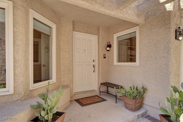 5142 Southern Hills Ln, Las Vegas, NV 89113 - doorway to property with stucco siding