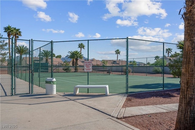 4644 Canna Dr, Las Vegas, NV 89122 - view of tennis court featuring fence and a gate