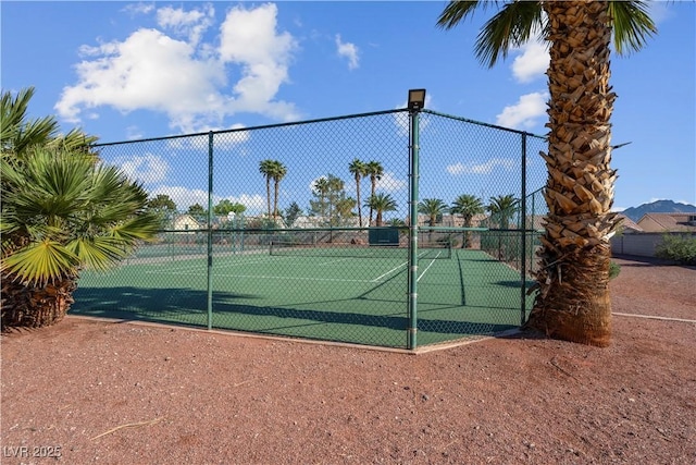 4644 Canna Dr, Las Vegas, NV 89122 - view of tennis court featuring fence
