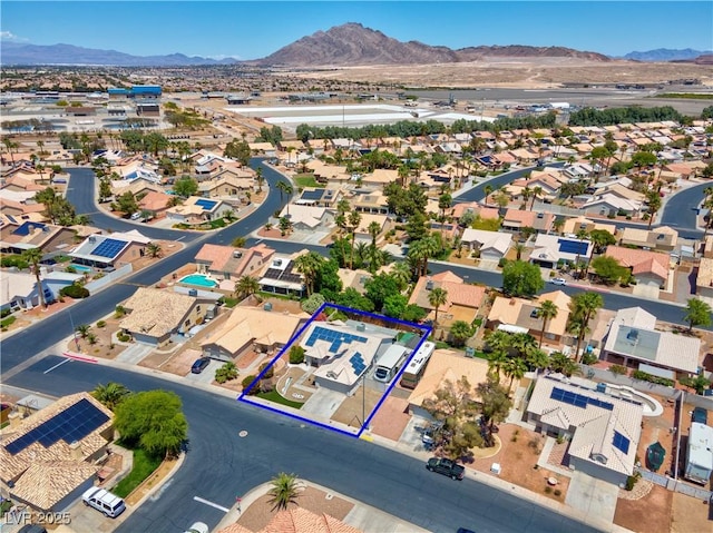 4644 Canna Dr, Las Vegas, NV 89122 - aerial view of residential area with a mountainous background and property parcel outlined