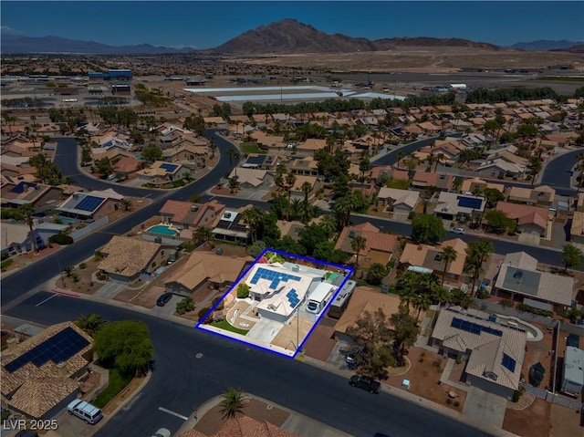 4644 Canna Dr, Las Vegas, NV 89122 - aerial perspective of suburban area with a mountain backdrop and property parcel outlined
