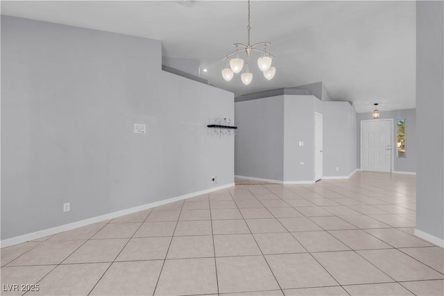 4644 Canna Dr, Las Vegas, NV 89122 - empty room with a chandelier, light tile patterned floors, and baseboards