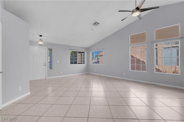 4644 Canna Dr, Las Vegas, NV 89122 - spare room with ceiling fan, light tile patterned floors, baseboards, and high vaulted ceiling