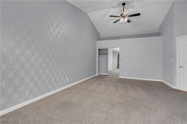 4644 Canna Dr, Las Vegas, NV 89122 - carpeted empty room with a ceiling fan, baseboards, and lofted ceiling