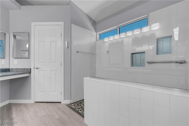 4644 Canna Dr, Las Vegas, NV 89122 - full bathroom featuring walk in shower and wood finished floors