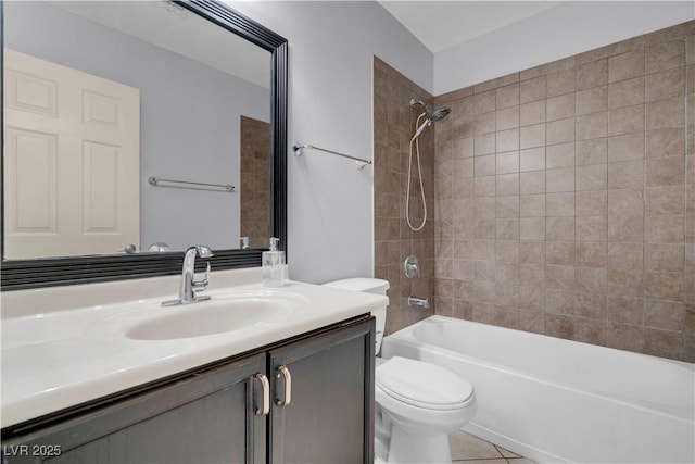 4644 Canna Dr, Las Vegas, NV 89122 - bathroom featuring toilet, vanity,  shower combination, and tile patterned floors