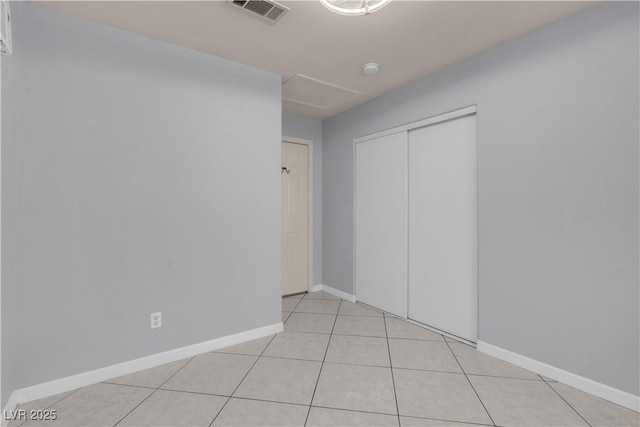 4644 Canna Dr, Las Vegas, NV 89122 - unfurnished room featuring baseboards and light tile patterned flooring