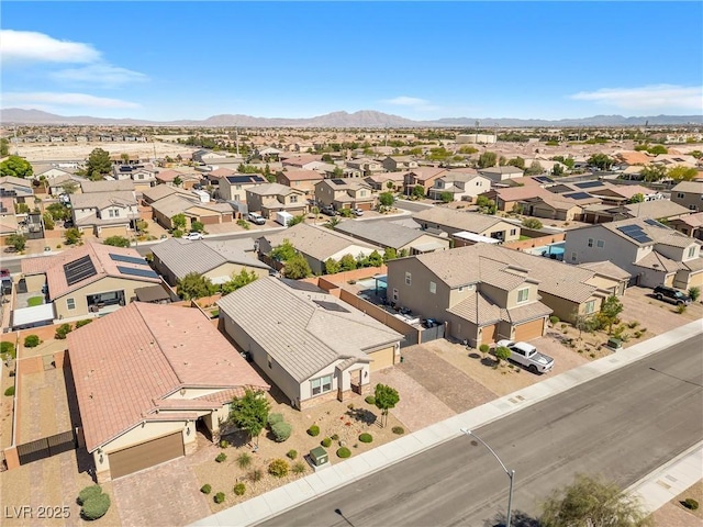 aerial perspective of suburban area with a mountain backdrop