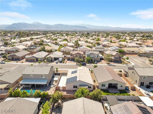 aerial perspective of suburban area with mountains
