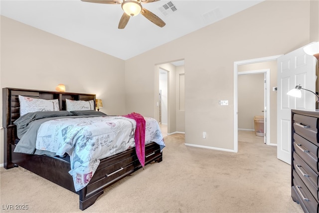bedroom with light colored carpet, baseboards, and a ceiling fan