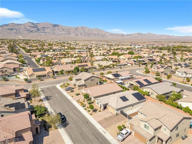 aerial perspective of suburban area with a mountain backdrop