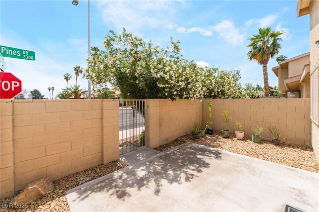2261 Tall Pine Dr, Las Vegas, NV 89108 - view of patio / terrace featuring fence and a gate