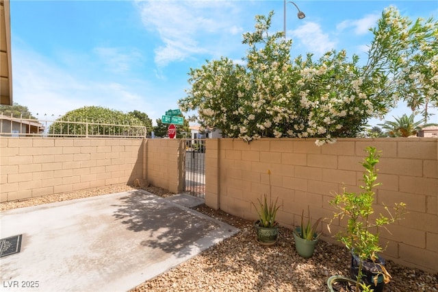 2261 Tall Pine Dr, Las Vegas, NV 89108 - view of patio / terrace featuring fence and a gate