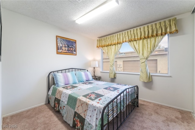 2261 Tall Pine Dr, Las Vegas, NV 89108 - bedroom featuring carpet flooring, a textured ceiling, and baseboards