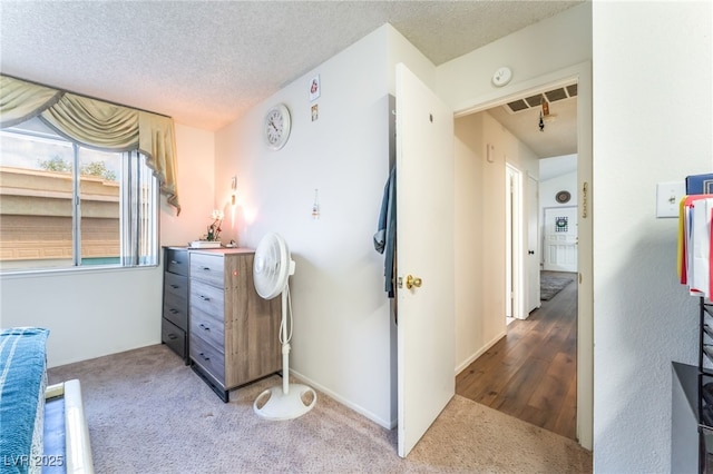 2261 Tall Pine Dr, Las Vegas, NV 89108 - bedroom with carpet floors and a textured ceiling