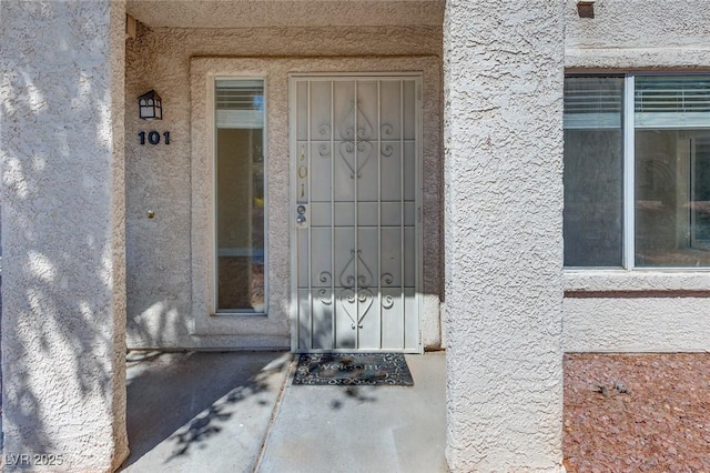 5217 Caspian Springs Dr Unit 101, Las Vegas, NV 89120 - view of exterior entry featuring stucco siding