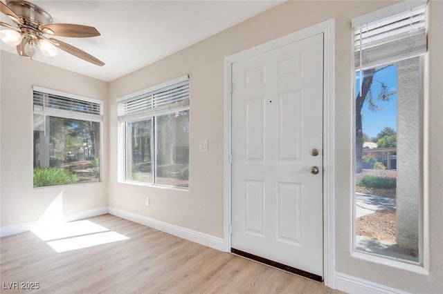 5217 Caspian Springs Dr Unit 101, Las Vegas, NV 89120 - foyer entrance featuring wood finished floors, ceiling fan, and baseboards