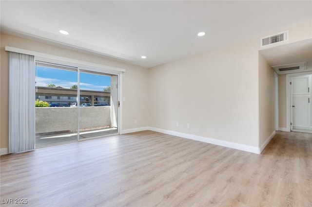 5217 Caspian Springs Dr Unit 101, Las Vegas, NV 89120 - unfurnished room with wood finished floors, baseboards, and recessed lighting