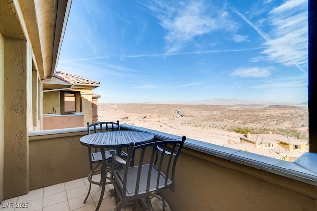 balcony featuring a mountain view