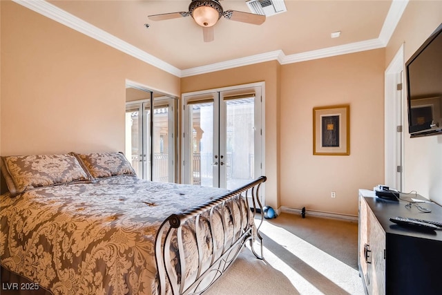 bedroom featuring light carpet, access to exterior, french doors, ornamental molding, and baseboards
