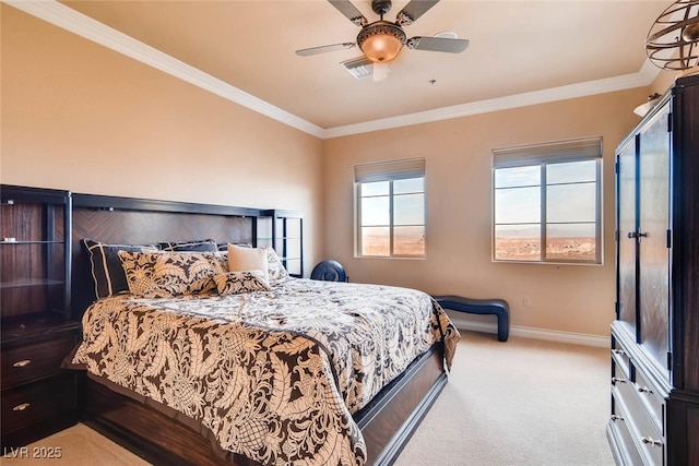carpeted bedroom with crown molding, baseboards, and ceiling fan