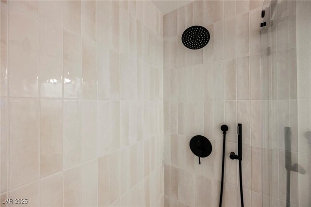 bathroom view of tiled shower